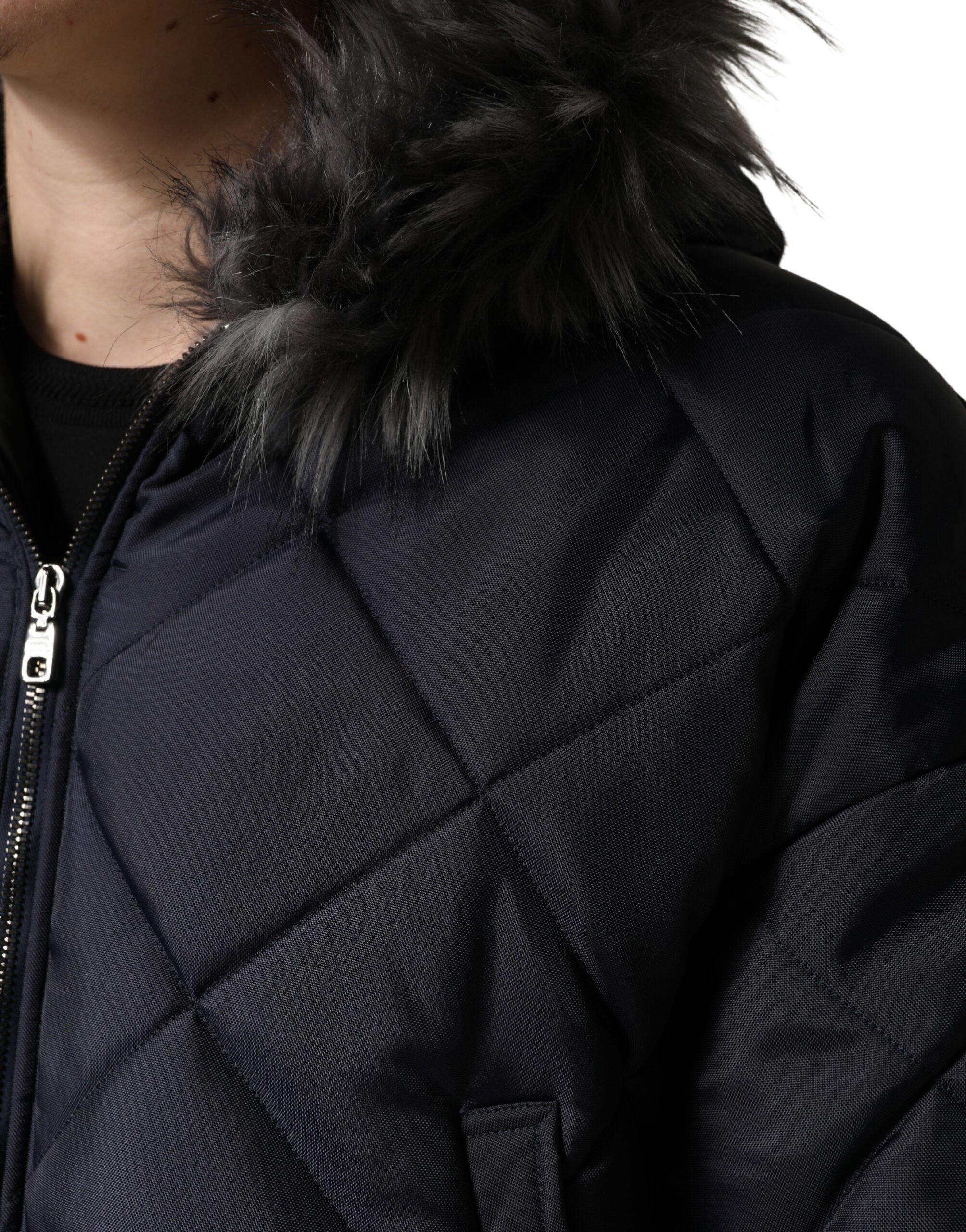 Blouson à capuche matelassé en fourrure ciselée noire Dolce & Gabbana