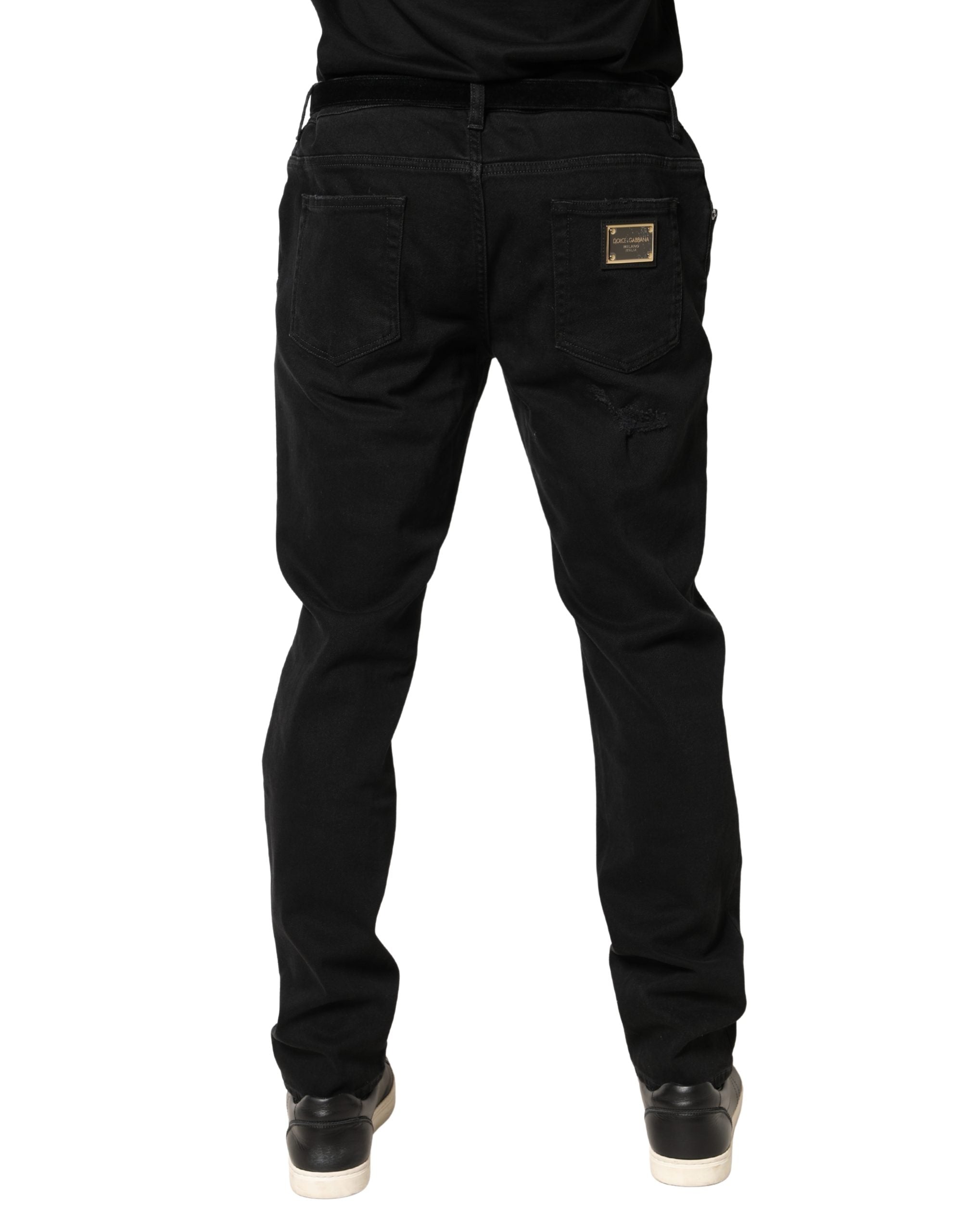 Dolce & Gabbana Schwarze zerfetzte Skinny Jeans aus Baumwoll-Denim