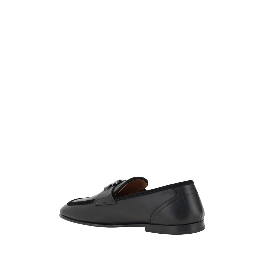 Dolce & Gabbana Schwarze Slipper aus Kalbsleder Bos Taurus