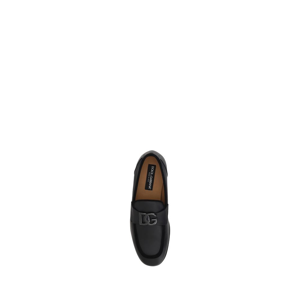 Dolce & Gabbana Schwarze Slipper aus Kalbsleder Bos Taurus