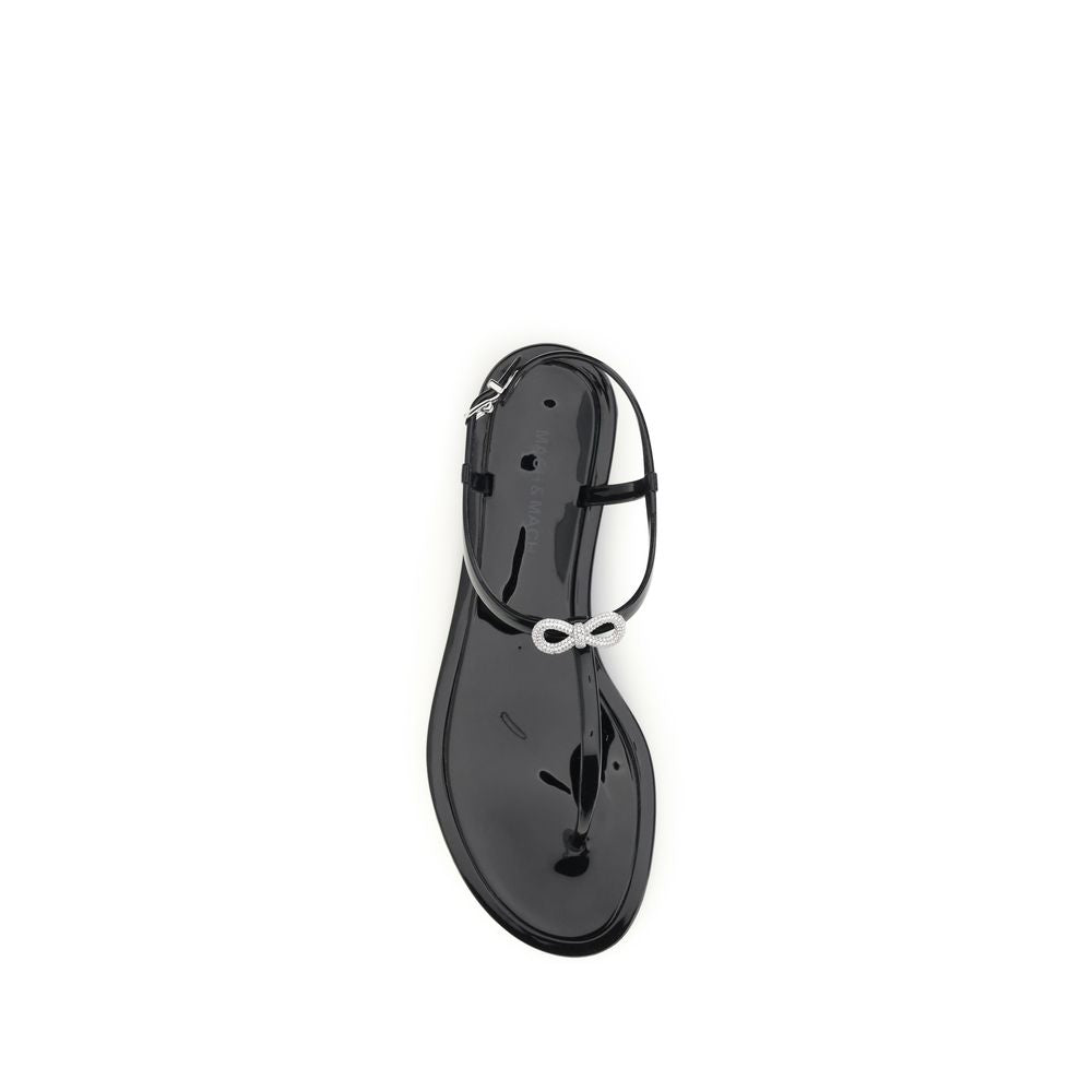 MACH & MACH Schwarze flache Sandalen aus Gummi