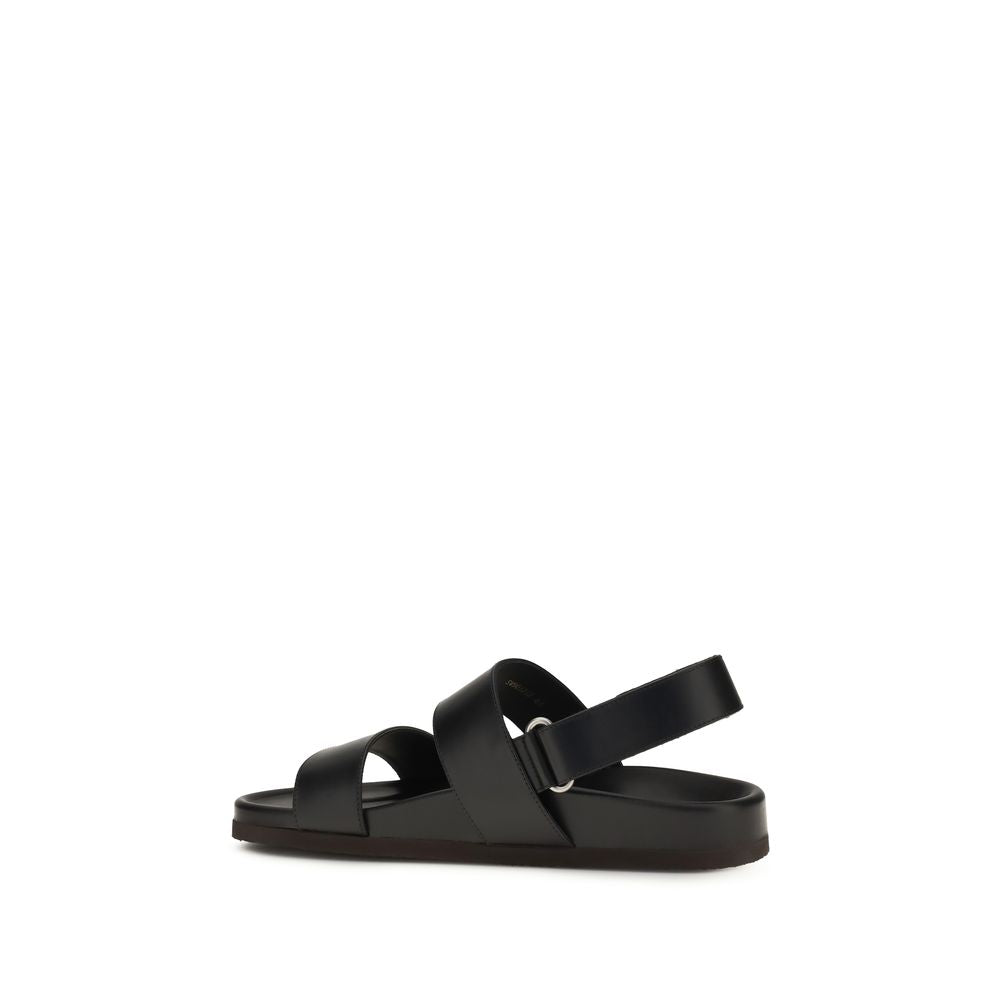 Valentino Garavani Schwarze flache Sandalen aus Kalbsleder Bos Taurus