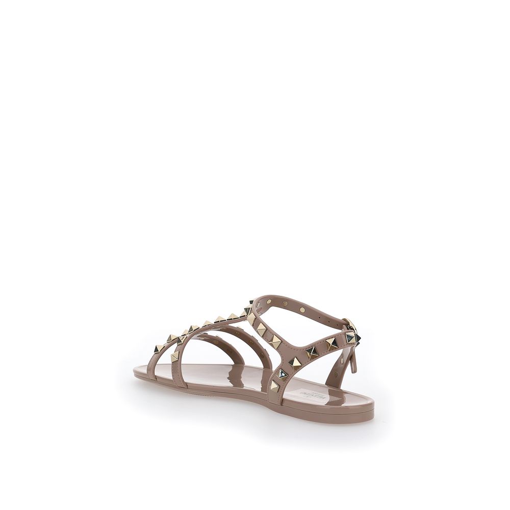 Valentino Garavani Rosafarbene flache Sandalen aus PVC