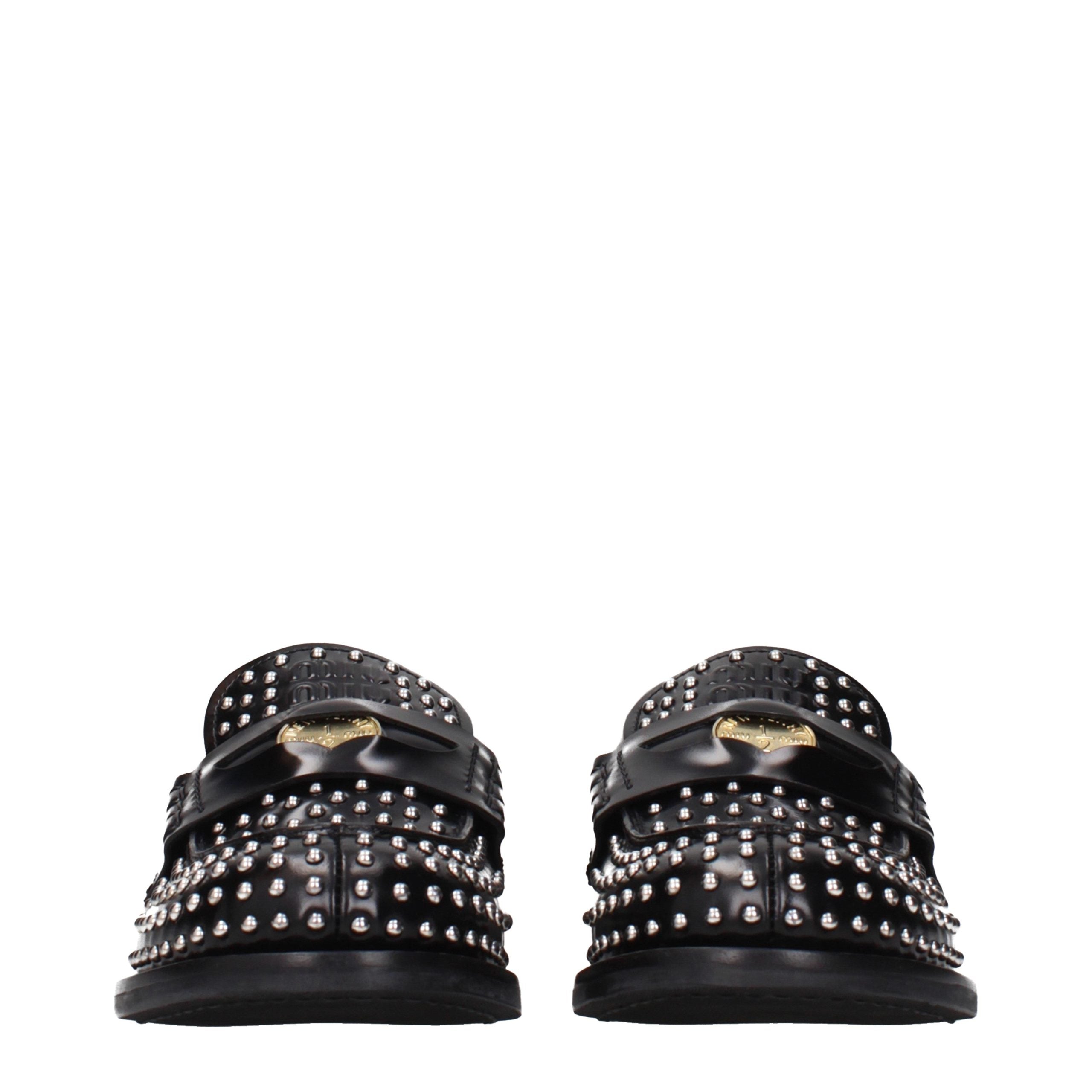 Miu Miu Slip-on Loafer aus schwarzem Leder