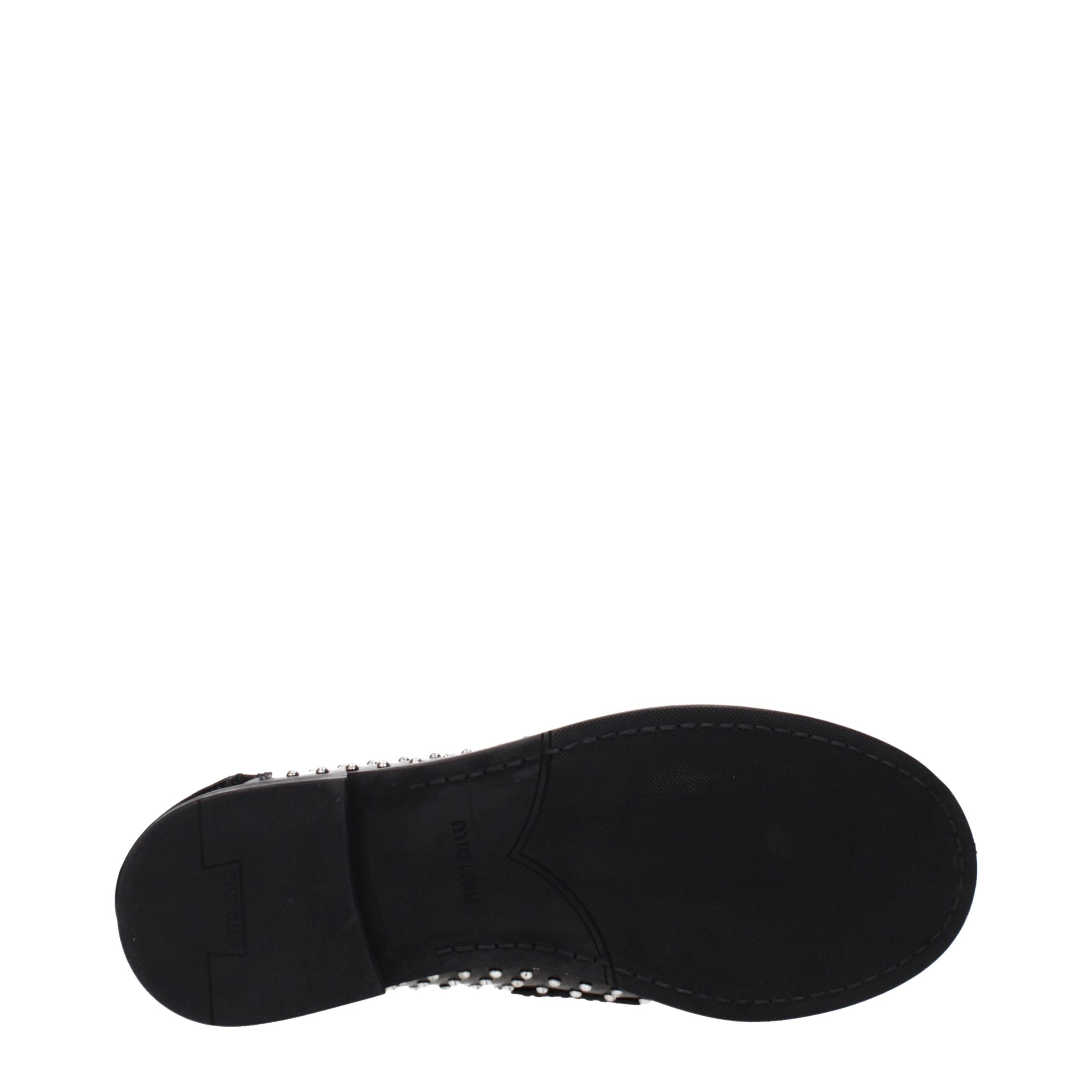 Miu Miu Slip-on Loafer aus schwarzem Leder