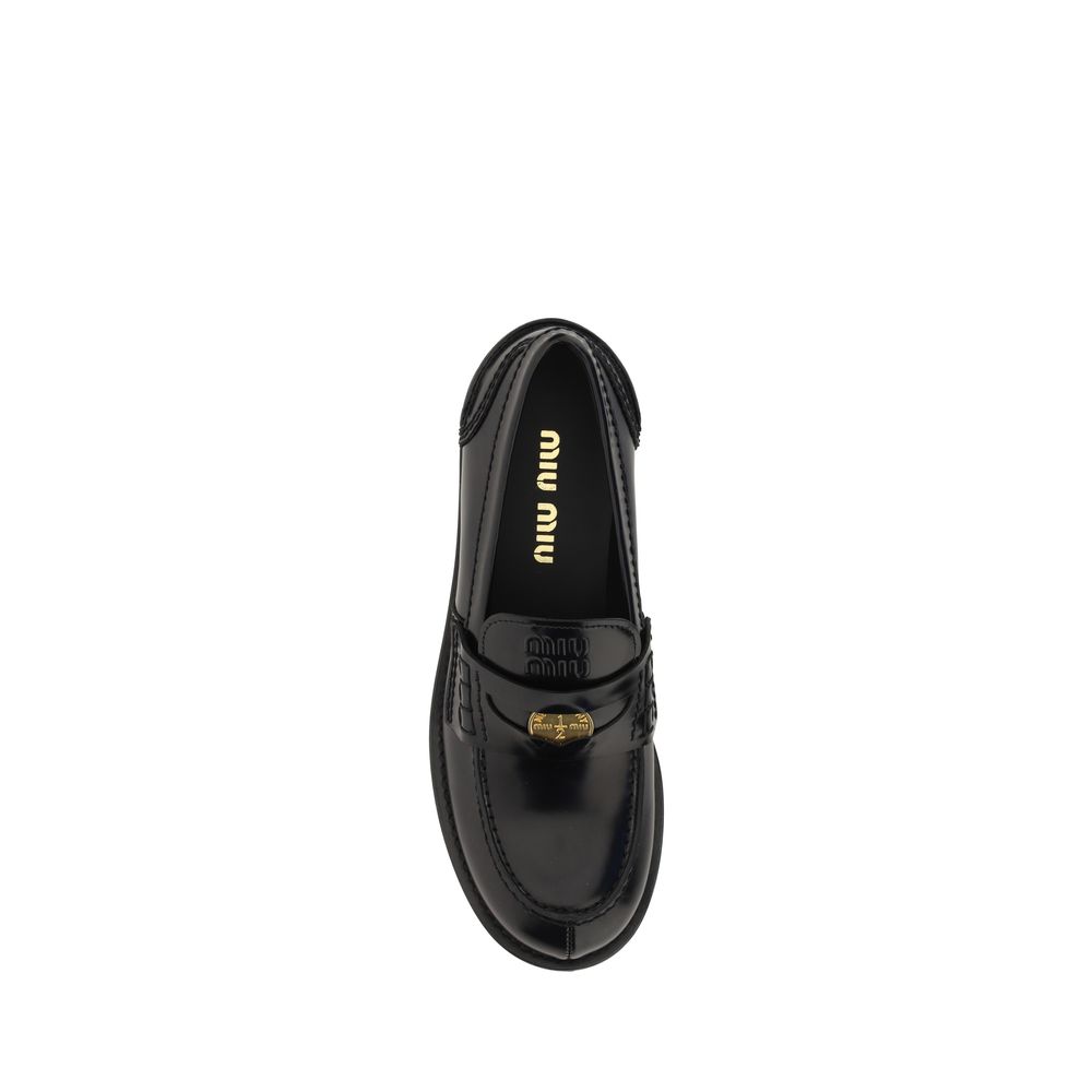 Miu Miu Black Rubber Slip-On Loafers