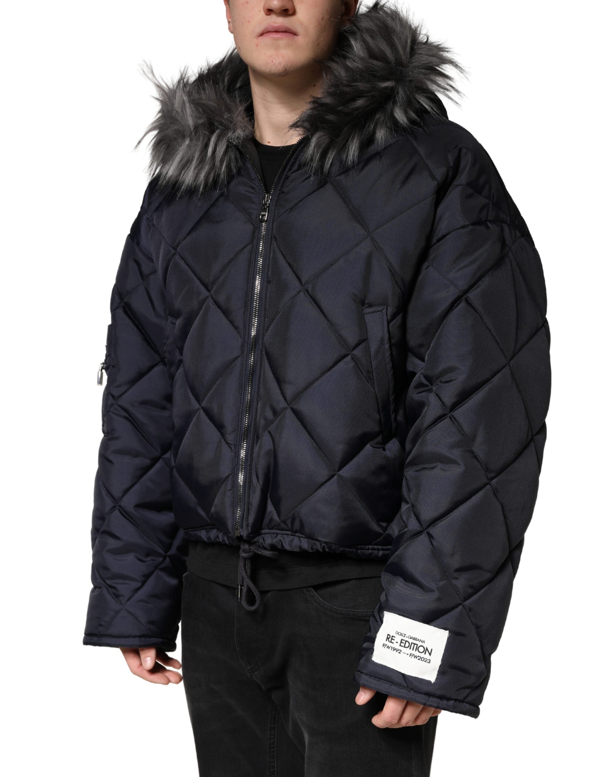 Blouson à capuche matelassé en fourrure ciselée noire Dolce & Gabbana