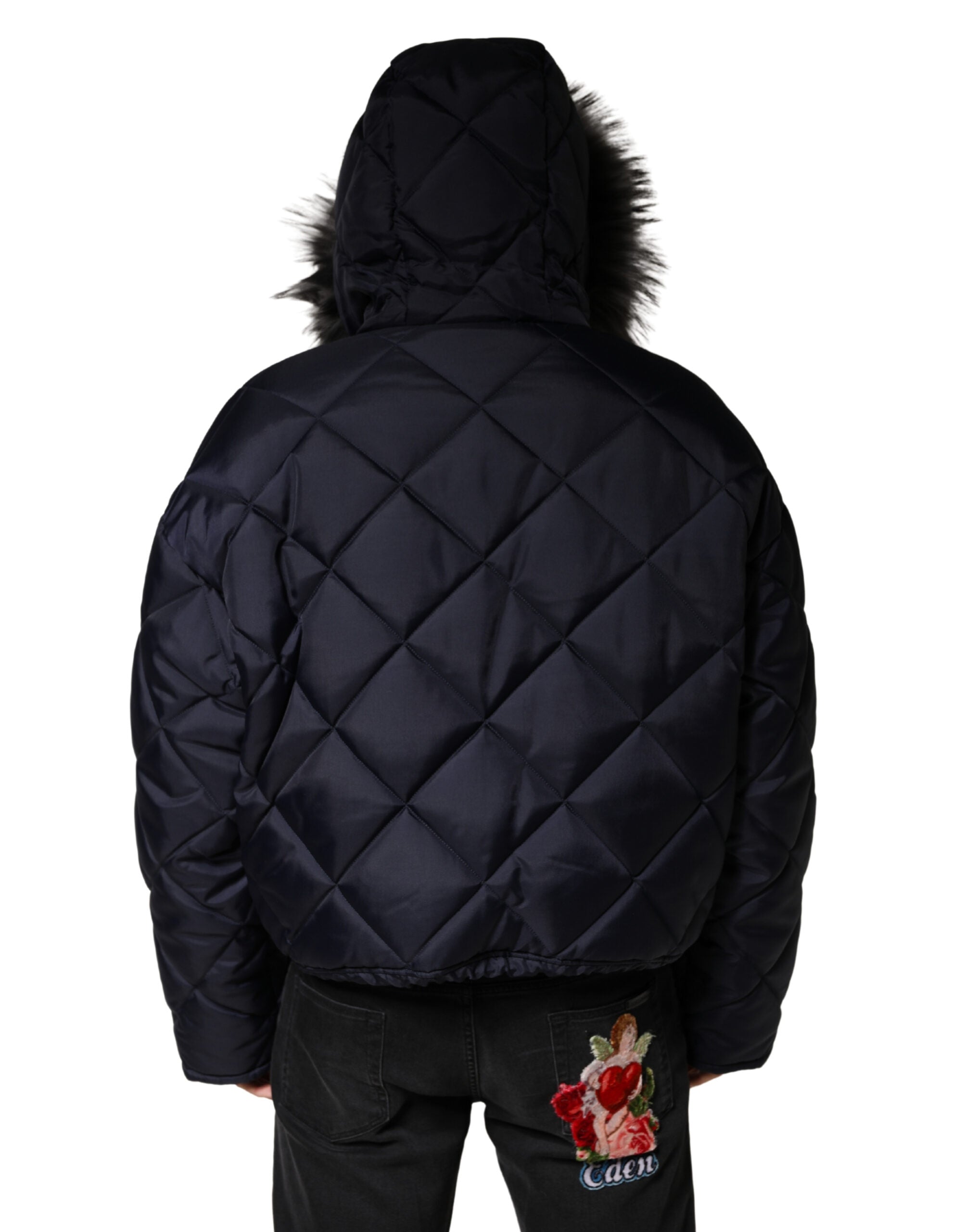 Blouson à capuche matelassé en fourrure ciselée noire Dolce & Gabbana
