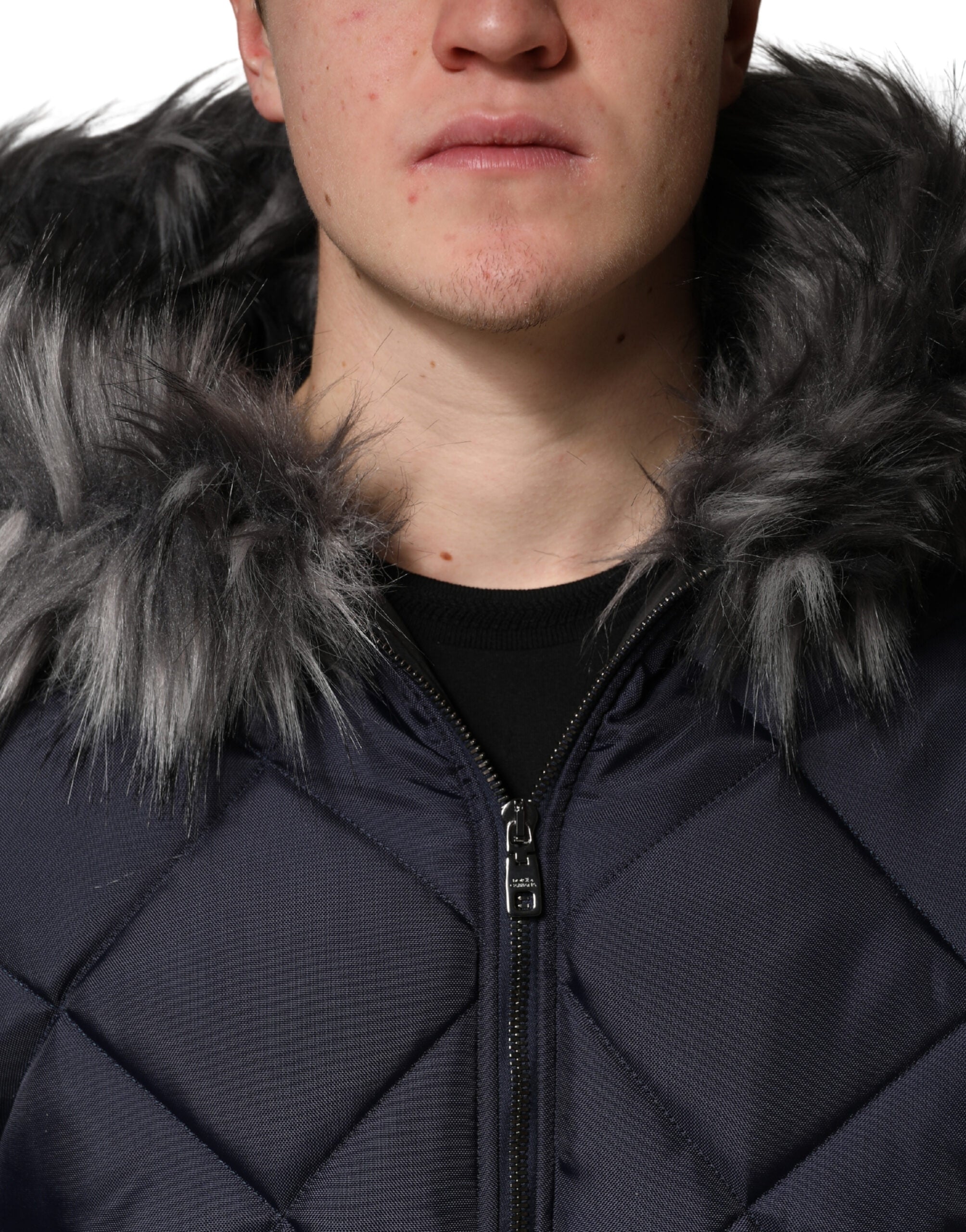 Blouson à capuche matelassé en fourrure ciselée noire Dolce & Gabbana
