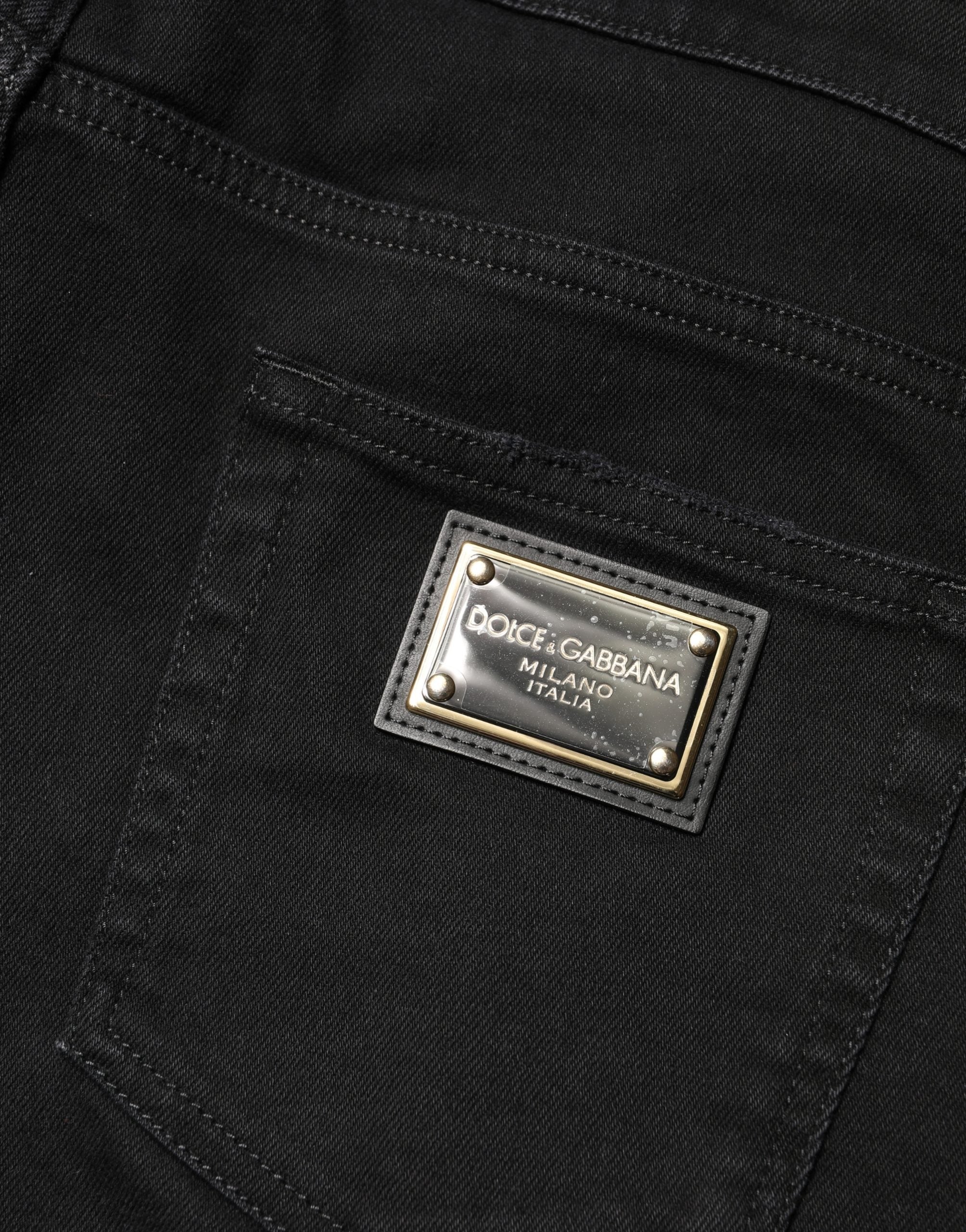 Dolce & Gabbana Schwarze zerfetzte Skinny Jeans aus Baumwoll-Denim