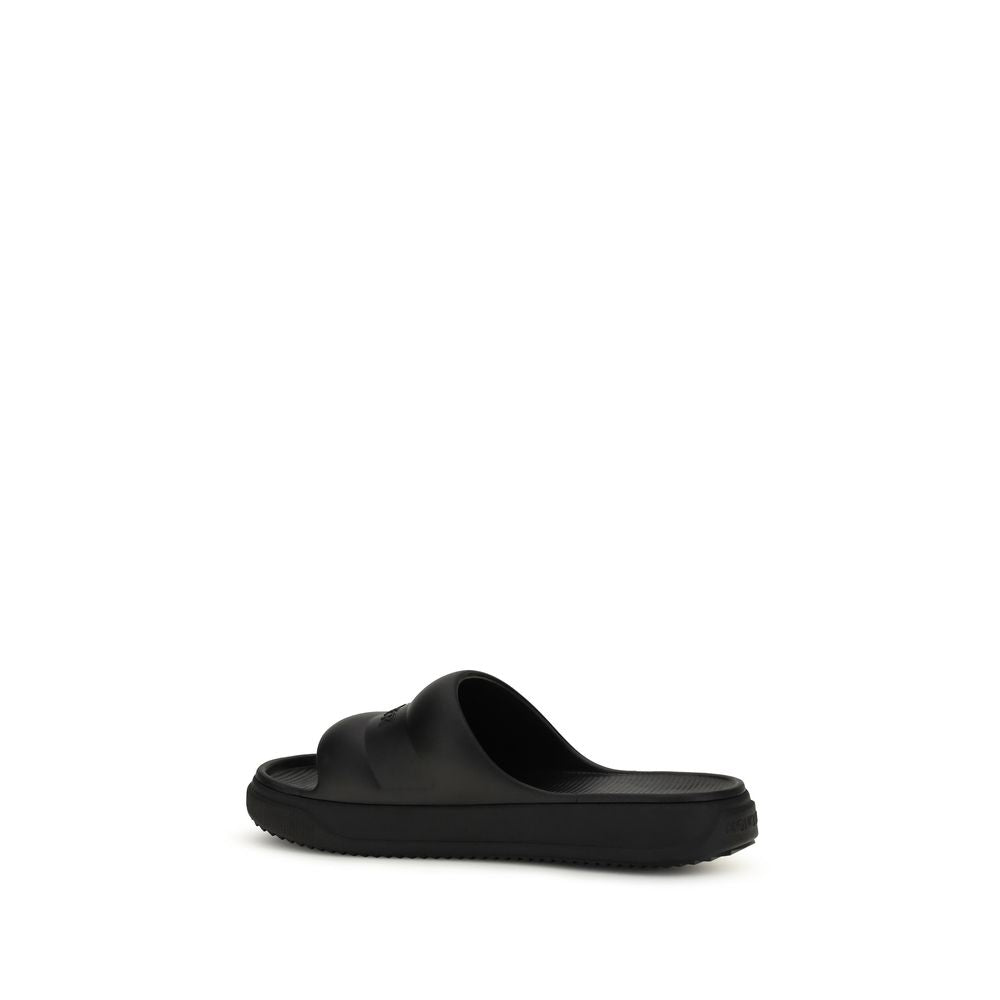 Moncler Schwarze flache Sandalen aus Gummi