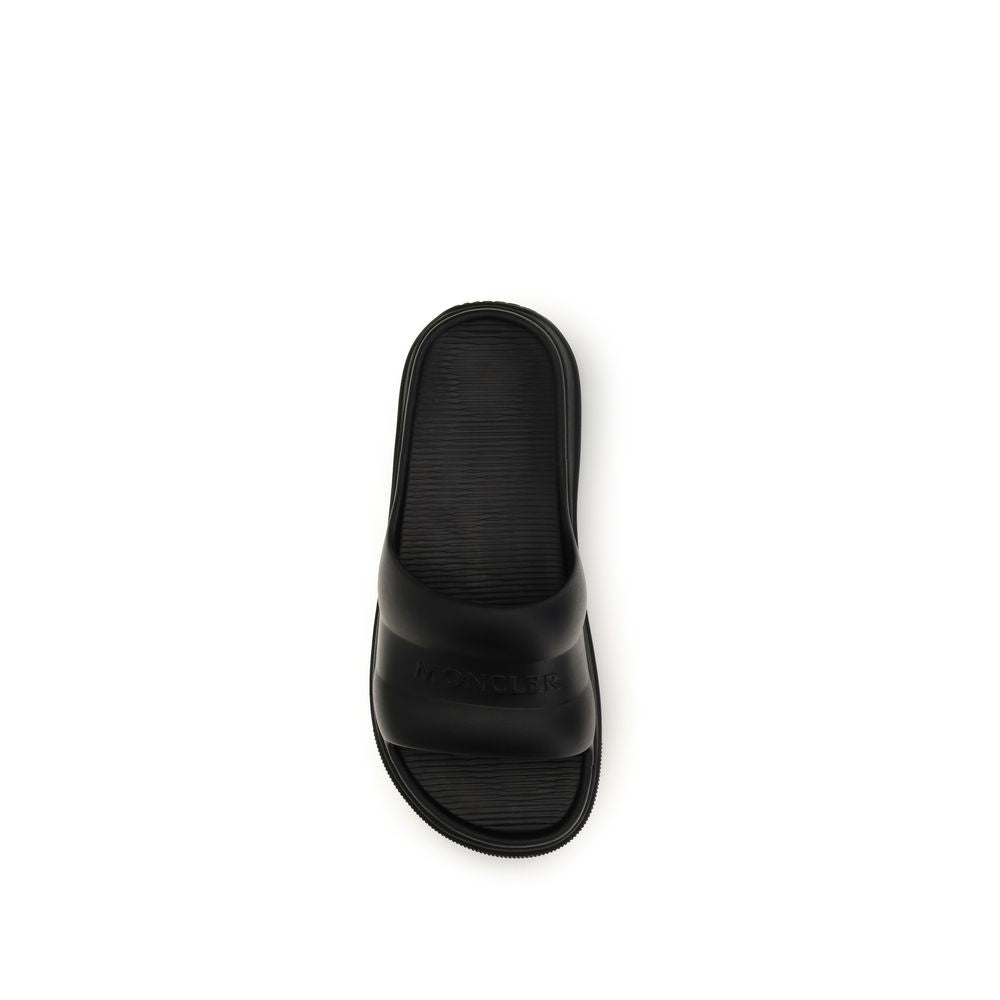 Moncler Schwarze flache Sandalen aus Gummi