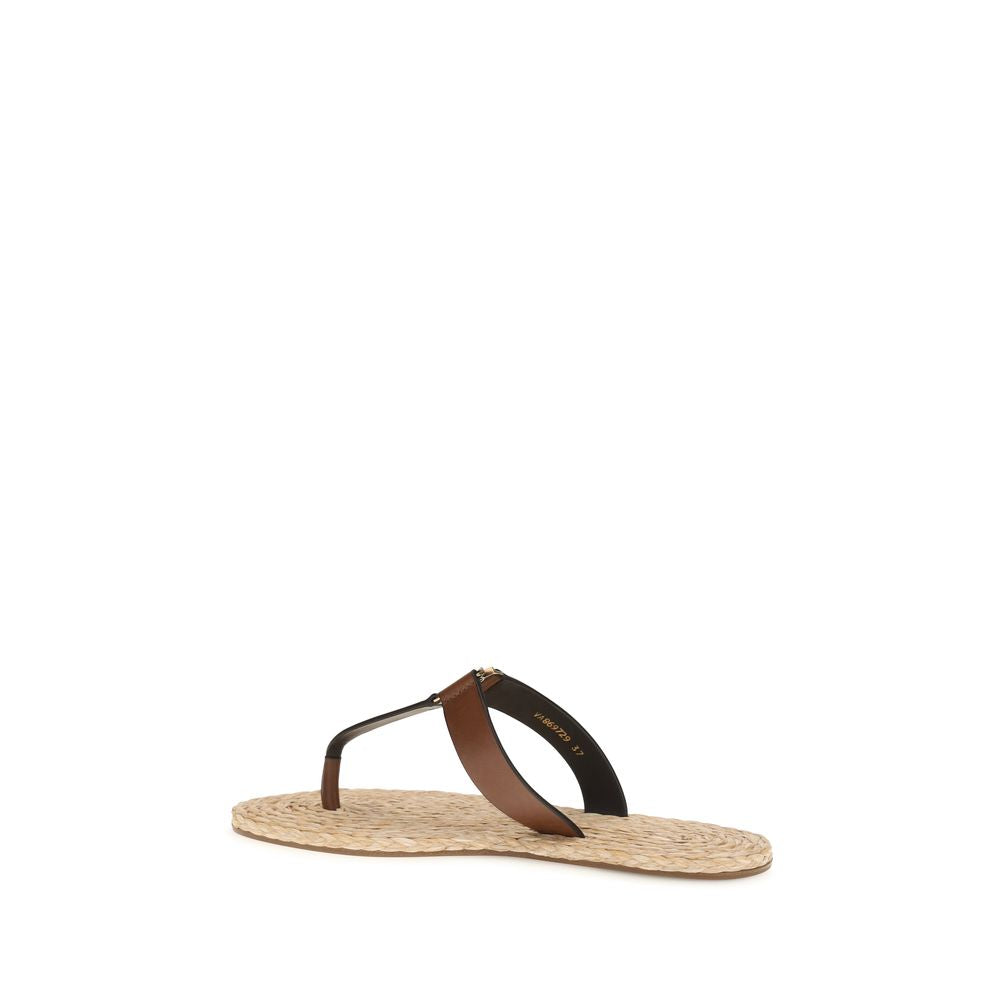 Saint Laurent Braune Kalbsleder-Bos-Taurus-Flachsandale