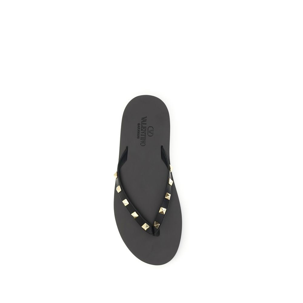 Valentino Garavani Sandales tongs en cuir de veau noir Bos Taurus