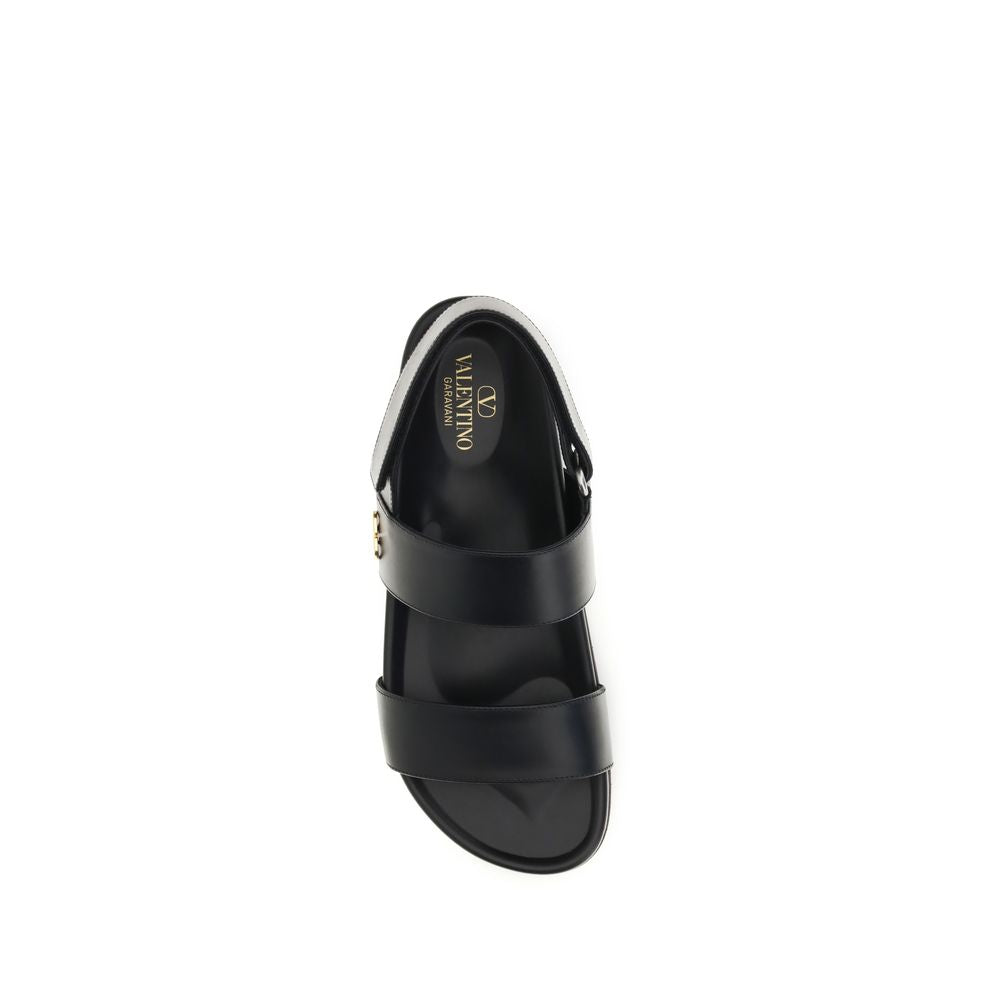 Valentino Garavani Schwarze flache Sandalen aus Kalbsleder Bos Taurus