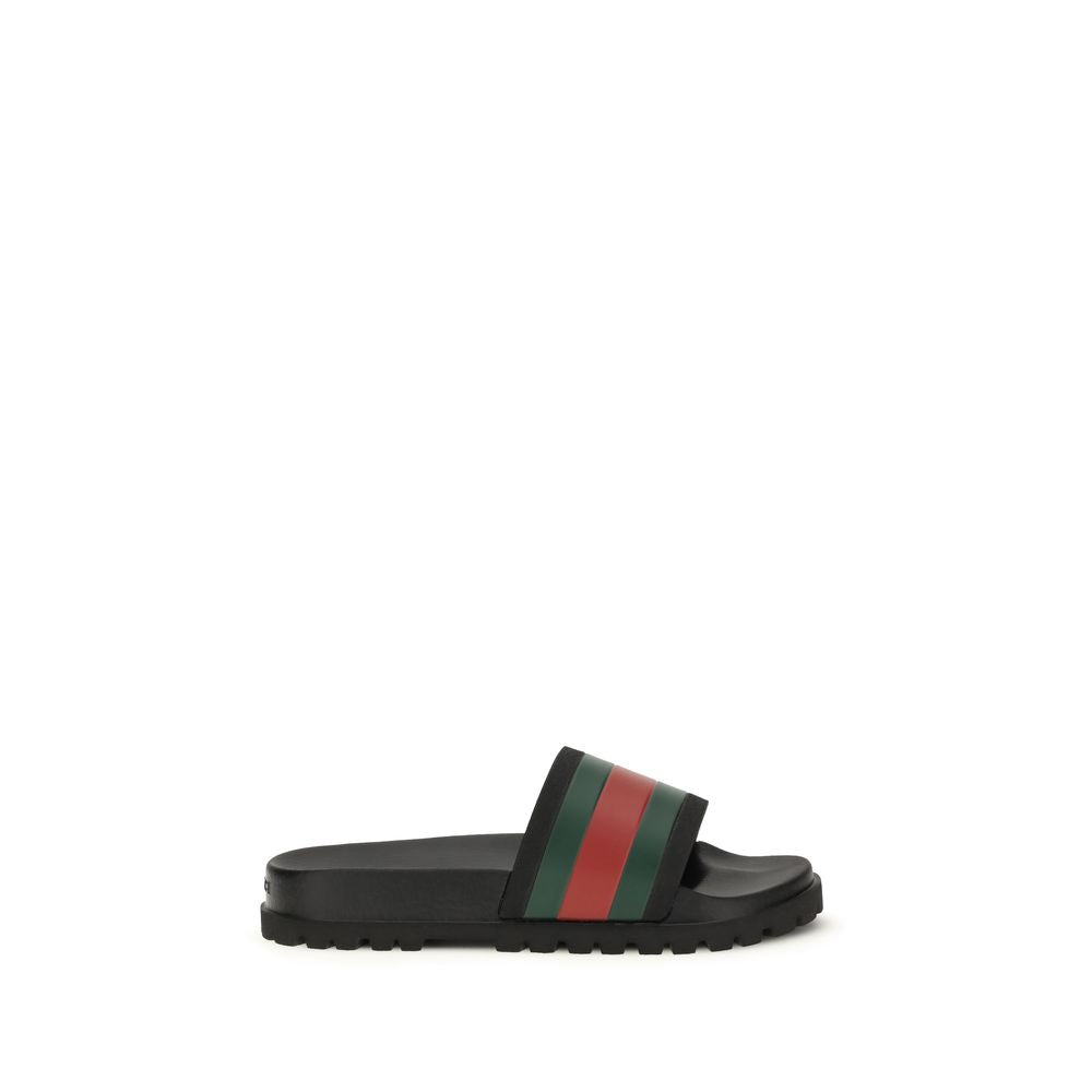 Mules Gucci en caoutchouc noir
