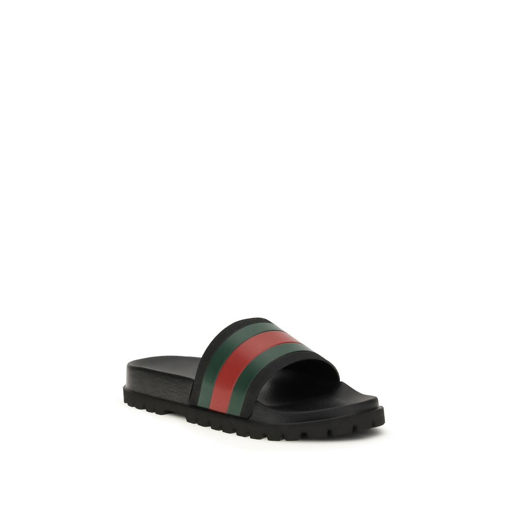 Mules Gucci en caoutchouc noir